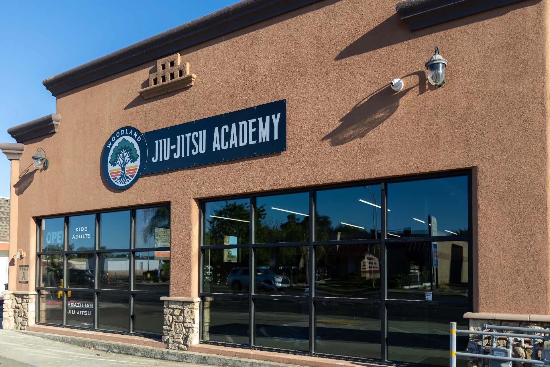 The Woodland Jiu-Jitsu Academy building sign on West Main Street