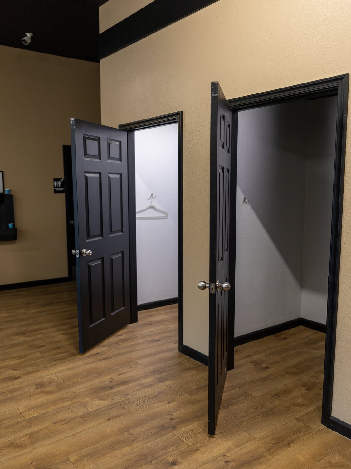 Two private changing rooms with latching doors off the lobby